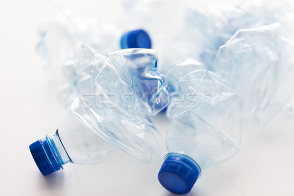 close up of empty used plastic bottles on table Stock photo © dolgachov