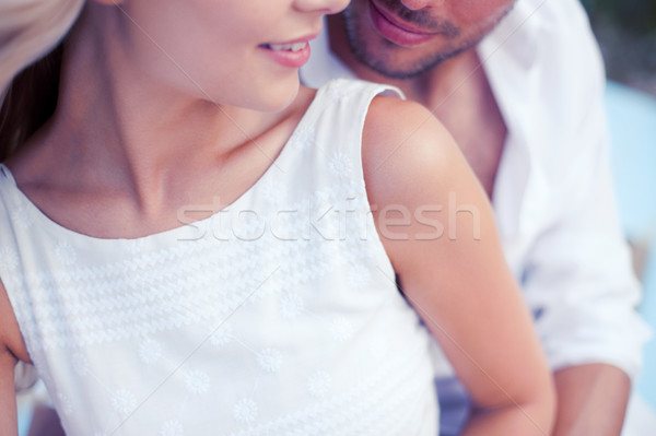 couple in shades at sea side Stock photo © dolgachov