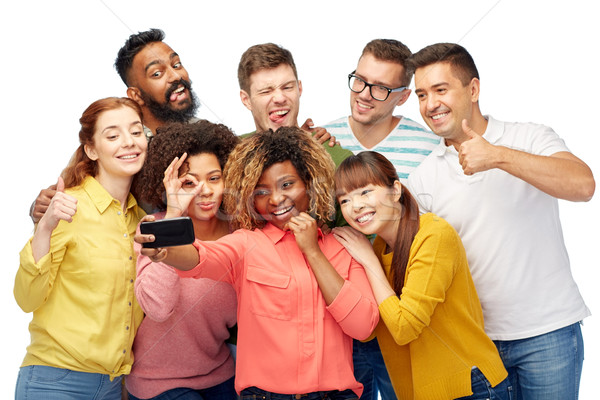 group of people taking selfie by smartphone Stock photo © dolgachov