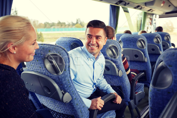 group of happy passengers in travel bus Stock photo © dolgachov