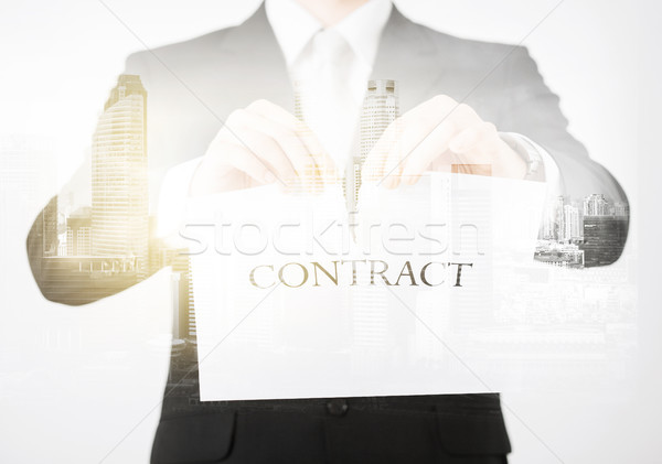 close up of businessman holding contract paper Stock photo © dolgachov
