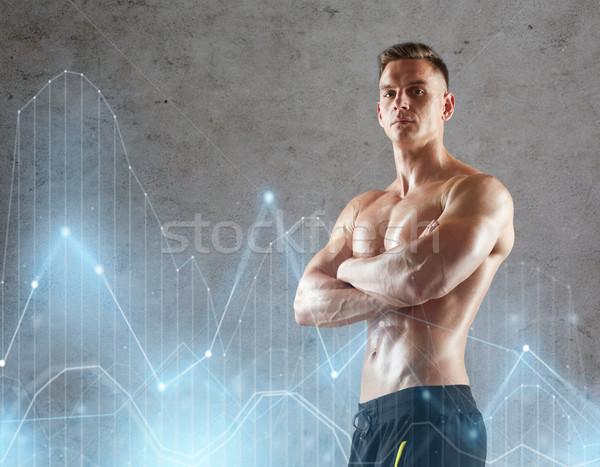 young man or bodybuilder with bare torso Stock photo © dolgachov