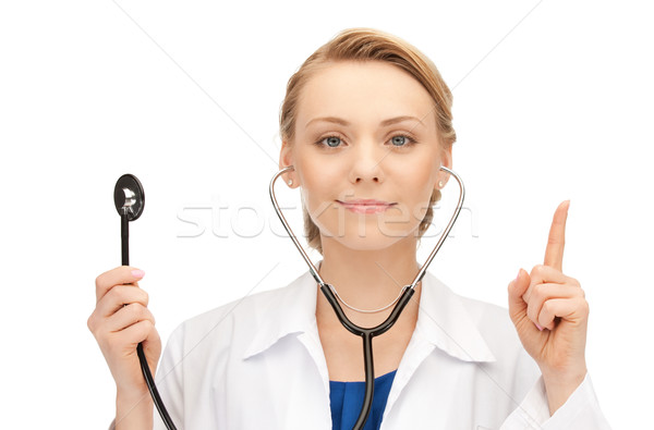 Привлекательная женщина врач стетоскоп фотография женщину девушки Сток-фото © dolgachov