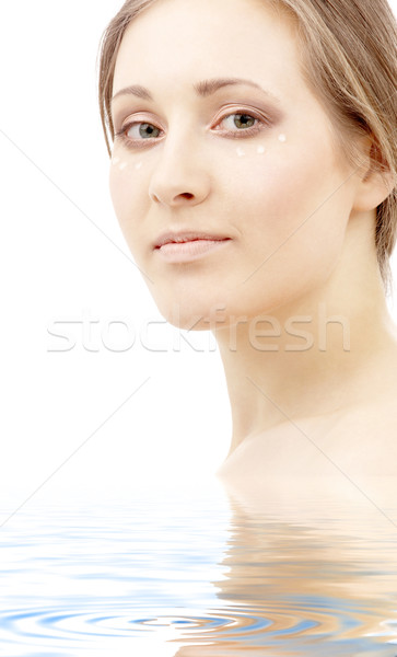 Hidratáló tej cseppek gyönyörű nő arc víz Stock fotó © dolgachov