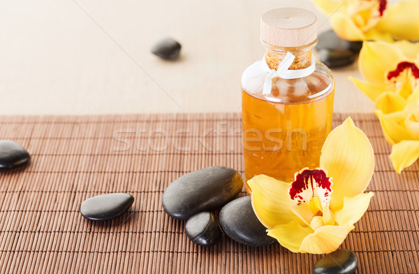 Massagem pedras orquídea flores estância termal Foto stock © dolgachov