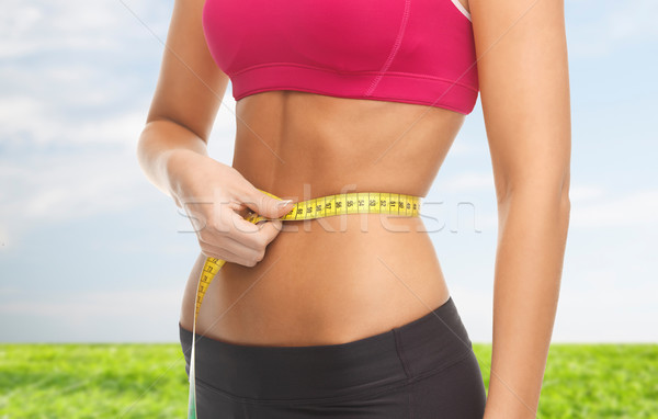 Geschult Bauch Maßband Fitness Ernährung Stock foto © dolgachov