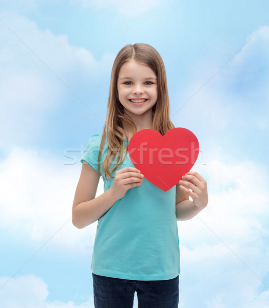 Sonriendo nina rojo corazón amor felicidad Foto stock © dolgachov