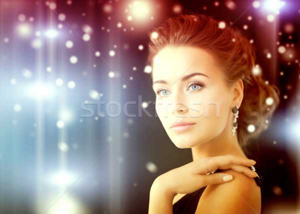 Stock photo: woman with diamond earrings