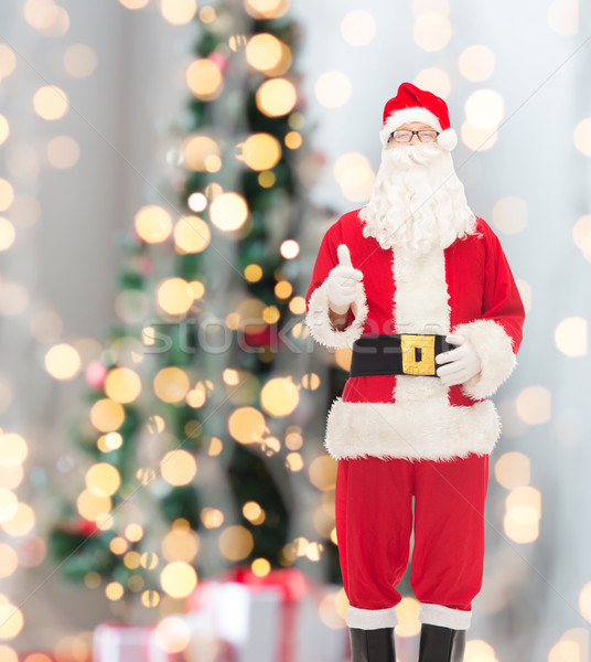 Uomo costume babbo natale Natale vacanze gesto Foto d'archivio © dolgachov
