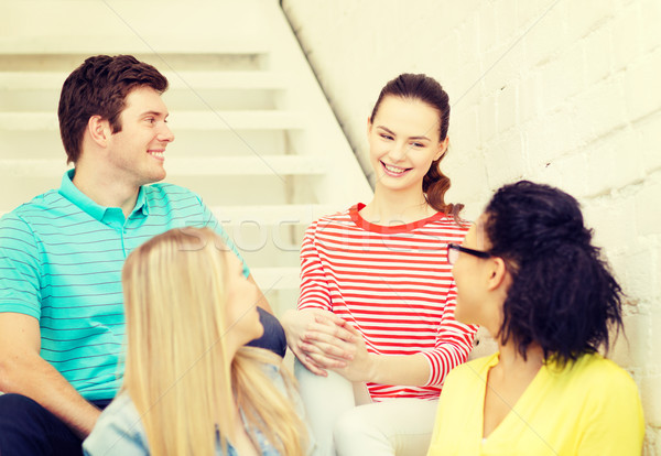 Stock photo: smiling teenagers hanging out