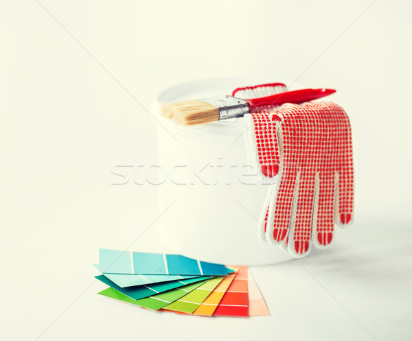 paintbrush, paint pot, gloves and pantone samplers Stock photo © dolgachov