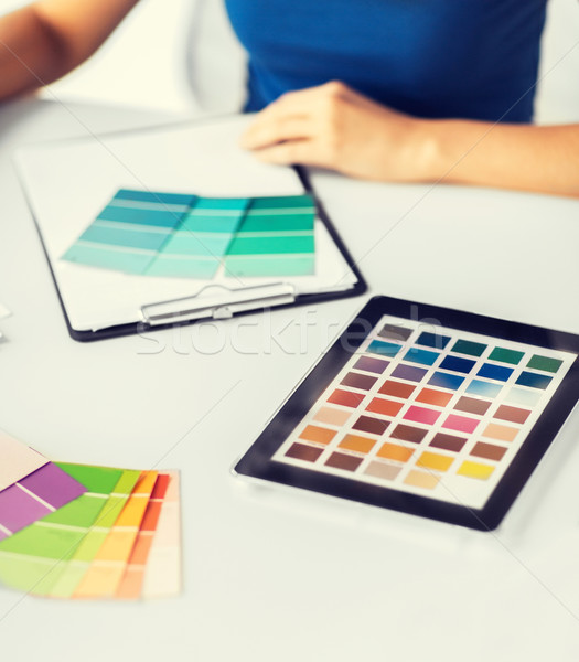 Stock photo: woman working with color samples for selection