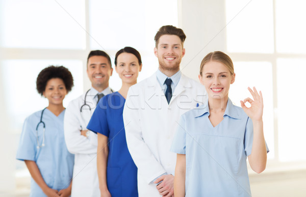 group of doctors and nurses at hospital Stock photo © dolgachov