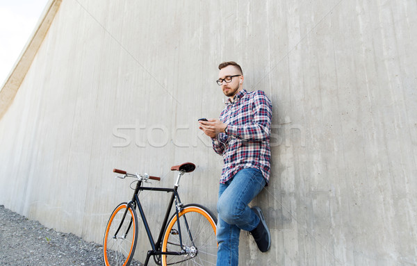 человека смартфон велосипедов люди Сток-фото © dolgachov
