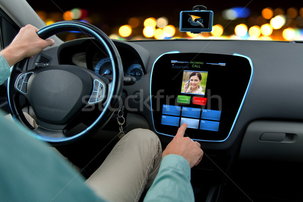 close up of man driving car and receiving call Stock photo © dolgachov