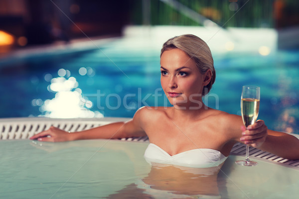 Stockfoto: Gelukkig · vrouw · drinken · champagne · zwembad · mensen