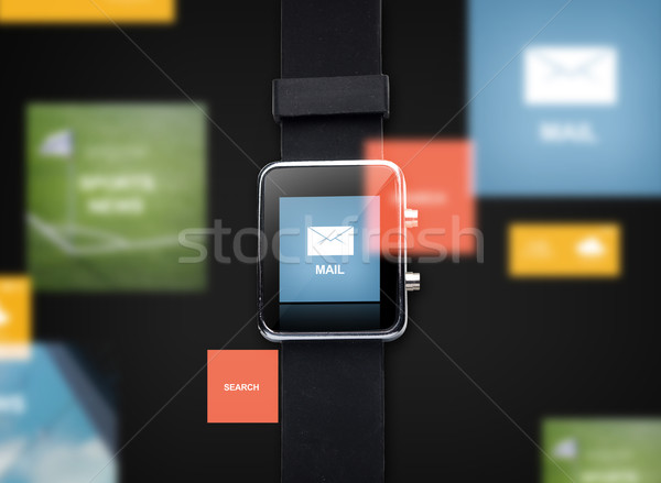 close up of smart watch with e-mail message icon Stock photo © dolgachov