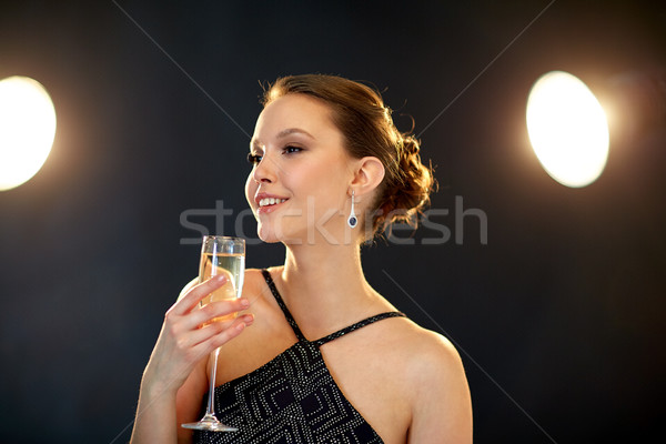 Giovani asian donna bere champagne party Foto d'archivio © dolgachov