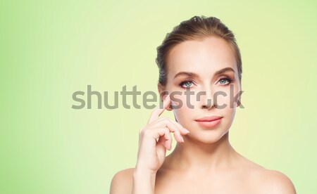 Boldog fiatal nő hidratáló krém kéz szépség Stock fotó © dolgachov