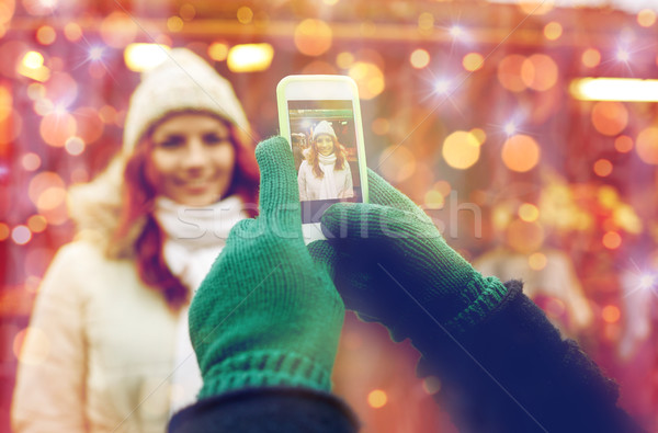 couple taking picture with smartphone in old town Stock photo © dolgachov