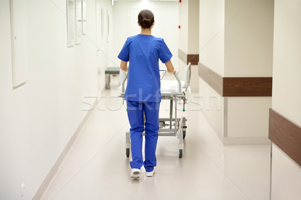 nurse carrying hospital gurney to emergency room Stock photo © dolgachov