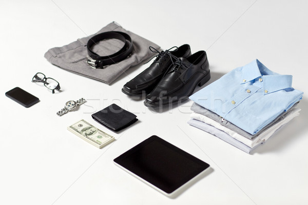 Stock photo: clothes, gadgets and business stuff on table