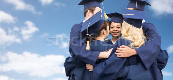 Gelukkig studenten bachelors blauwe hemel onderwijs Stockfoto © dolgachov