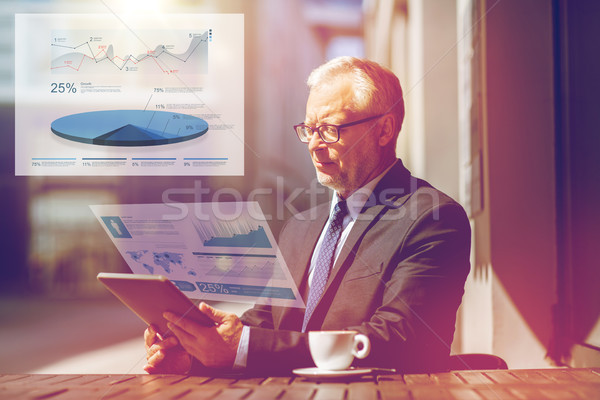 senior businessman with tablet pc drinking coffee Stock photo © dolgachov