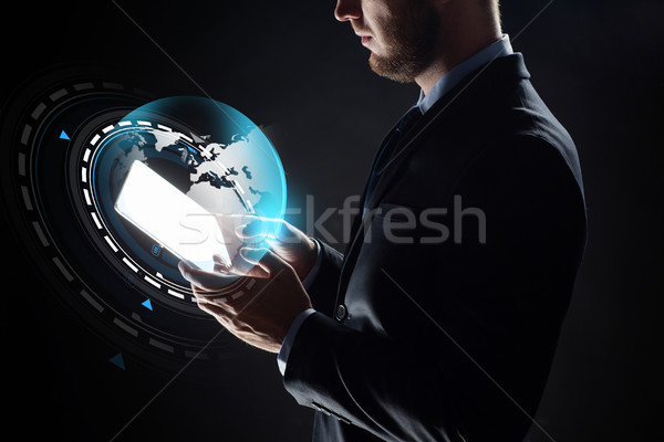close up of businessman with transparent tablet pc Stock photo © dolgachov