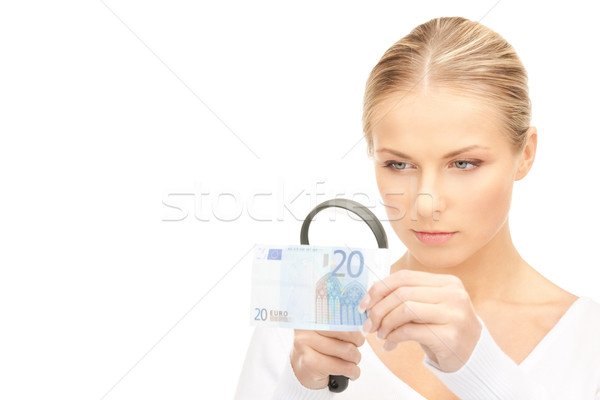 woman with magnifying glass and money Stock photo © dolgachov