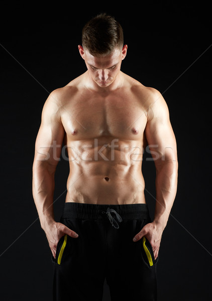 Moço musculação nu torso esportes Foto stock © dolgachov