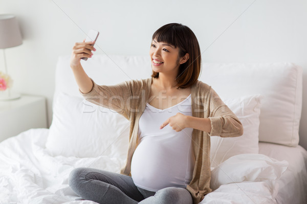 Foto stock: Mulher · grávida · casa · gravidez · tecnologia