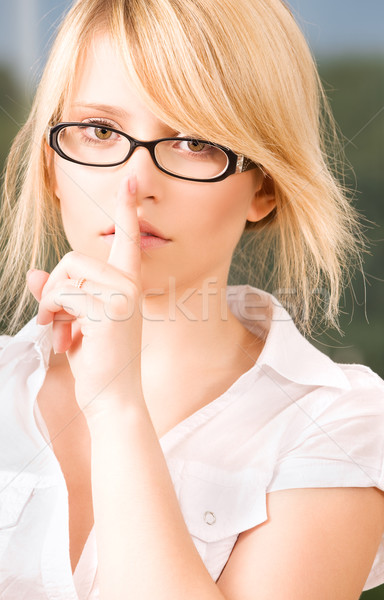 Brillante Foto dedo labios mujer Foto stock © dolgachov