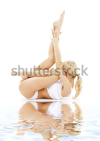 fit blond in white underwear practicing yoga Stock photo © dolgachov