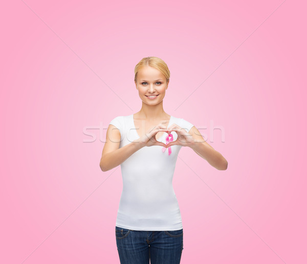 Kobieta tshirt różowy raka wstążka opieki zdrowotnej Zdjęcia stock © dolgachov