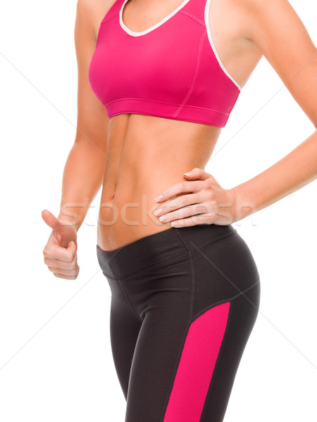 Közelkép női kéz mutat remek fitnessz Stock fotó © dolgachov