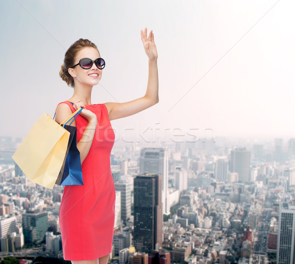 Souriant élégante femme robe Shopping Photo stock © dolgachov