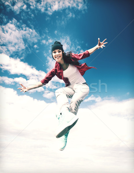Bella dancing ragazza jumping sport urbana Foto d'archivio © dolgachov