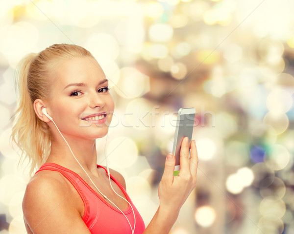 Sorridente mulher esportes Foto stock © dolgachov