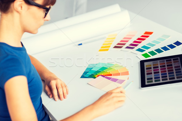 woman working with color samples for selection Stock photo © dolgachov