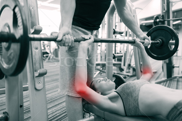 Człowiek kobieta sztanga mięśni siłowni sportu Zdjęcia stock © dolgachov
