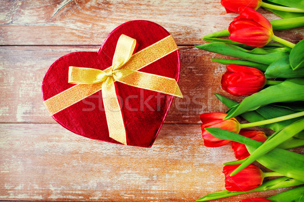 close up of red tulips and chocolate box Stock photo © dolgachov