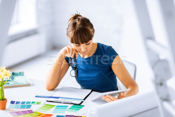 woman working with color samples for selection Stock photo © dolgachov