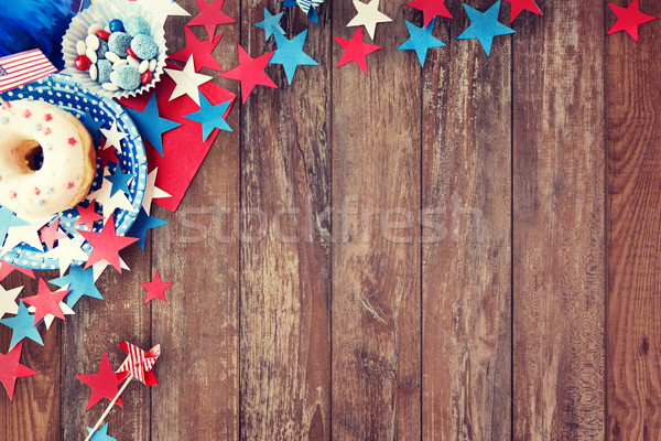 donut with candies and stars on independence day Stock photo © dolgachov