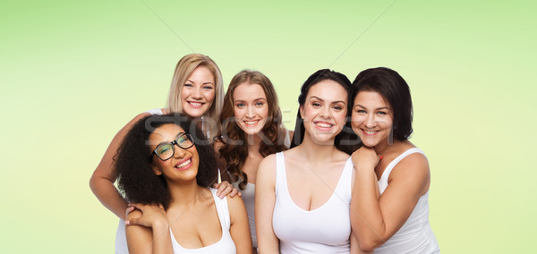 Grupo feliz diferente mulheres branco roupa interior Foto stock © dolgachov
