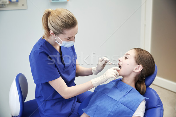 Stockfoto: Vrouwelijke · tandarts · patiënt · meisje · tanden · mensen