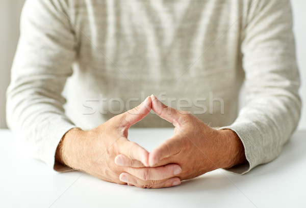 Közelkép idős férfi kezek háromszög erő aggkor Stock fotó © dolgachov