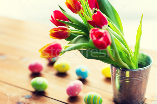 Paskalya yumurtası çiçekler kova Paskalya tatil Stok fotoğraf © dolgachov