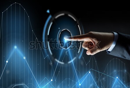 close up of businessman hand showing small size Stock photo © dolgachov