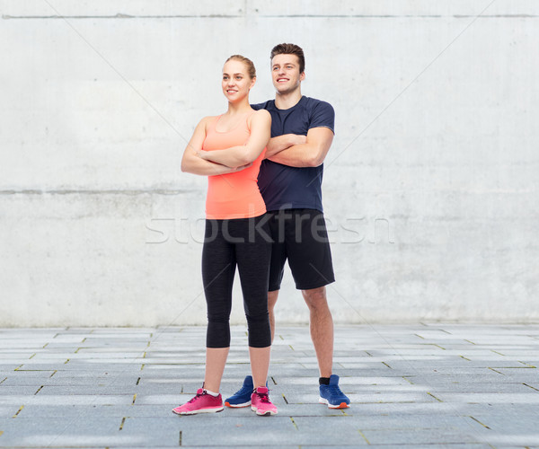 Stock photo: happy sportive man and woman